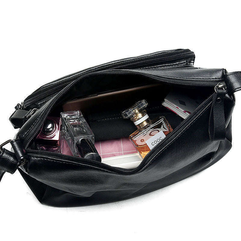 Bolsa Avery Pequena Tiracolo em Couro Macio