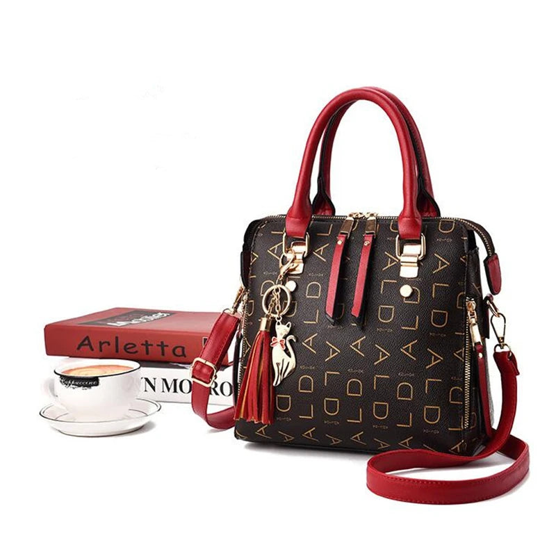 Bolsa Julia de Ombro de Couro com Tassel