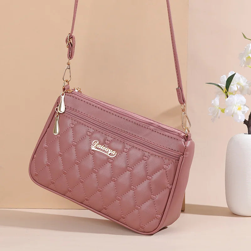 Bolsa Emery de Couro com Alça Transversal e Zíper