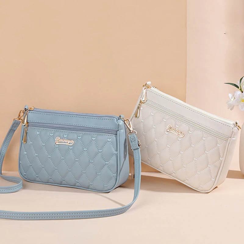 Bolsa Emery de Couro com Alça Transversal e Zíper