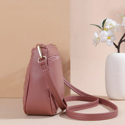 Bolsa Emery de Couro com Alça Transversal e Zíper