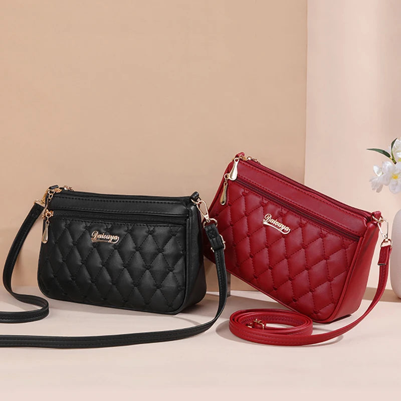 Bolsa Emery de Couro com Alça Transversal e Zíper