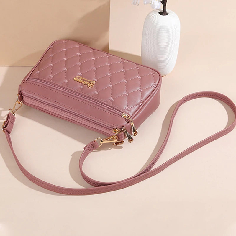 Bolsa Emery de Couro com Alça Transversal e Zíper