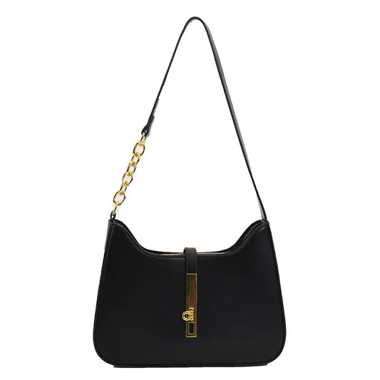 Bolsa Elowen de Ombro Compacta de Couro com Fechadura Magnética