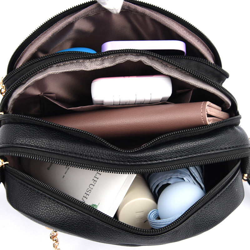 Bolsa Brooke Tiraclo de Couro com Design Vintage